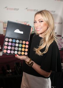 Stassi Schroeder of Vanderpump Rules with <a href="https://www.facebook.com/dollipopcosmetics" target="_blank">Dollipop Cosmetics</a>.