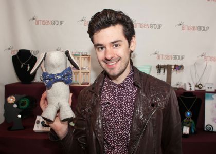Brendan Robinson of Pretty Little Liars with <a href="https://www.facebook.com/4blackpaws" target="_blank">Four Black Paws</a>.