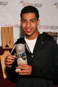 Marcus Schriber of "Black-ish" with Four Black Paws.