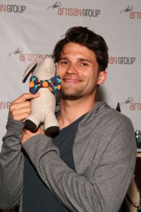Tom Schwartz of Bravo's "Vanderpump Rules" with Four Black Paws.